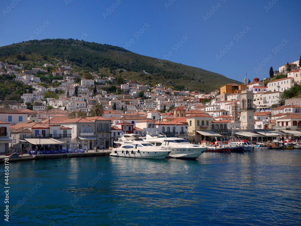 Poros island red roof white building village step on the hill