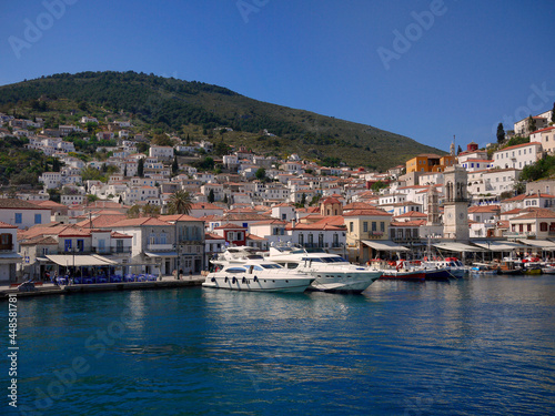 Poros island red roof white building village step on the hill