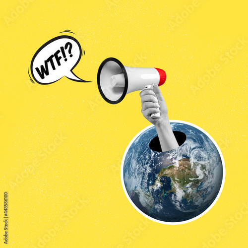 Creative artwork. Screaming planet. Hand with megaphone sticking out of the Earth image. photo