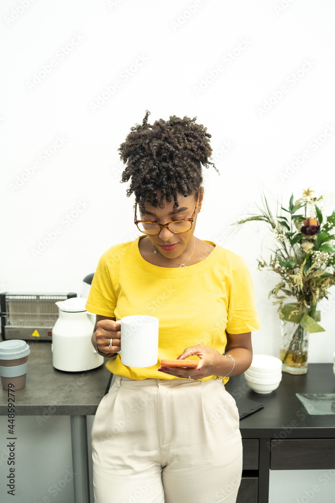 Young Male Manager Consults Beautiful Female Collegue and Discuss Working Issues at Her Workplace. She is Using Personal Computer and He Stands Beside Young Male Manager Consults Beautiful Female Collegue and Discuss Working Issues at Her Workplace. She is Using Personal Computer and He Stands Beside