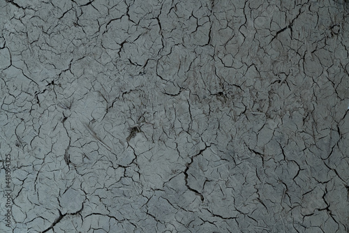 Cracked dry clay wall texture