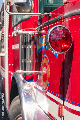 Details of an old american fire truck. Close-up of a red fire engine