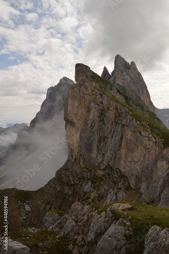Taking in the stunning mountain views from a steep ridge in the Dolomites  © ChrisOvergaard