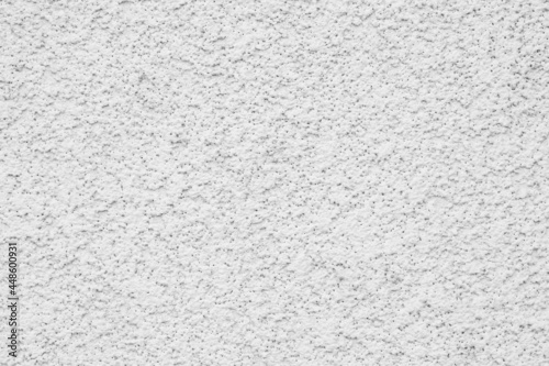 white porous plaster on the wall. background