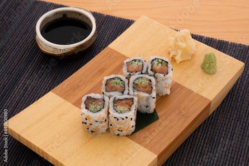 Salmon Roll with Soy Sauce, Pickled Sushi Ginger (Gari), wasabi.