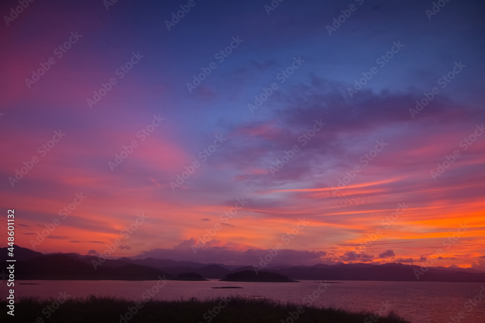 Colorful cloud ripple over a lake in an evening