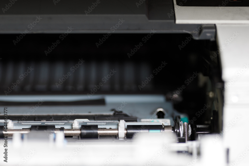 Internal parts of a laser printer. Maintenance and repair of office  equipment. foto de Stock | Adobe Stock