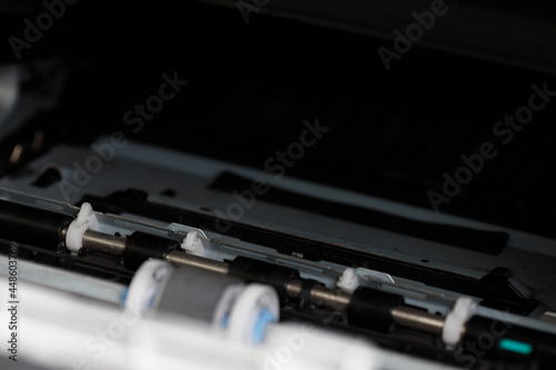 Internal parts of a laser printer. Maintenance and repair of office equipment.