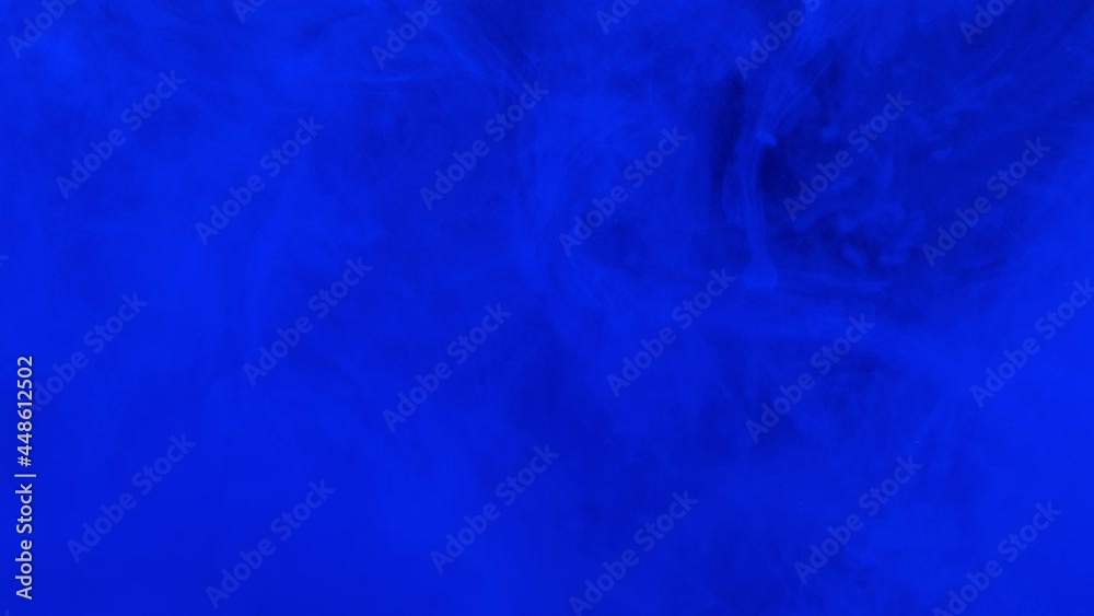 Blue ink acrylic paint mixing in water, swirling softly underwater. Colored acrylic cloud of paint in aquarium. Slow motion abstract smoke explosion animation. Beautiful art background Blue ink acrylic paint mixing in water, swirling softly underwater. Colored acrylic cloud of paint in aquarium. Slow motion abstract smoke explosion animation. Beautiful art background