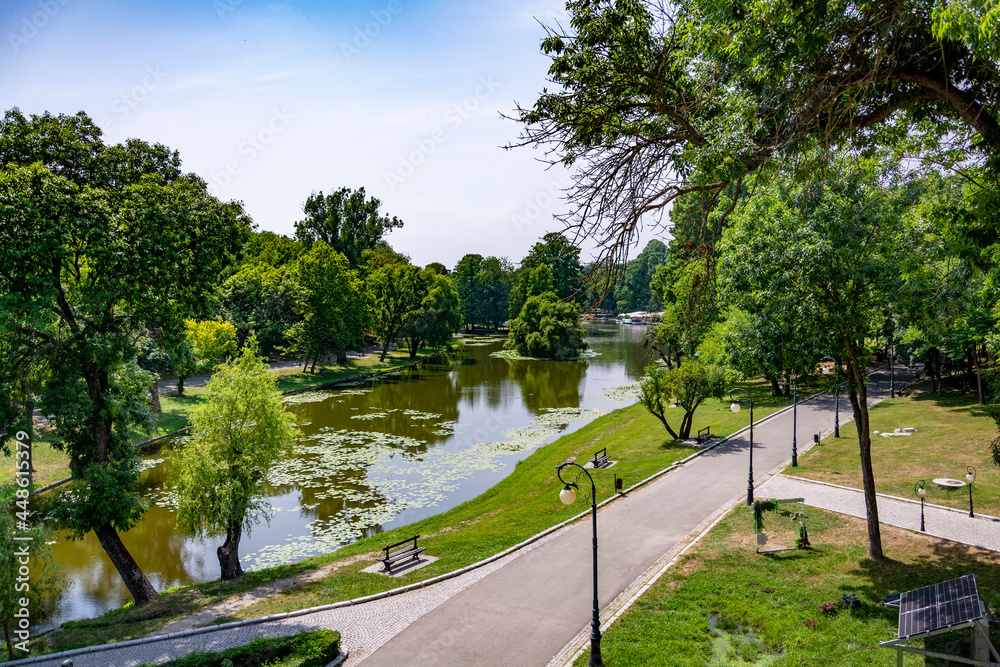 Beautiful sunny summer day in a green park in Craiova, Romania