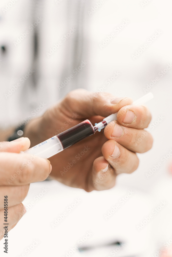 Vet doctor with blood sample Vet doctor with blood sample