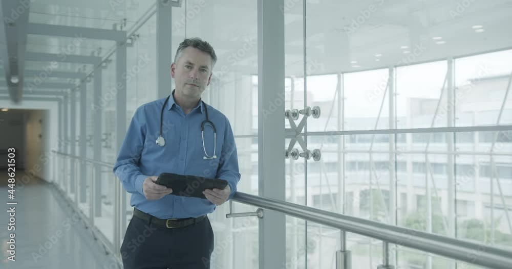 Portrait of doctor with digital tablet in a hospital Portrait of doctor with digital tablet in a hospital