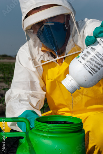 proper technique for mixing pesticides outdoors