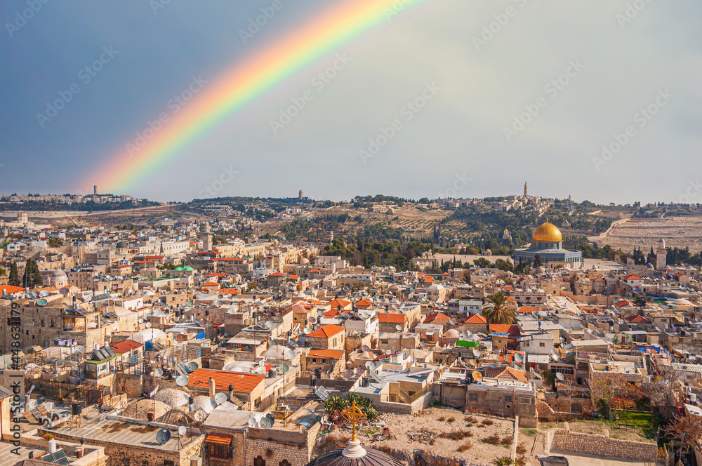 Naklejka premium Rainbow above the old town of Jerusalem