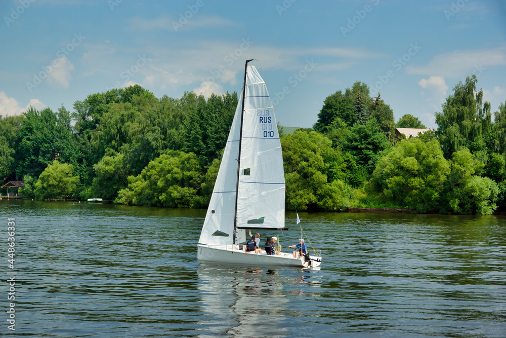 Moscow, Russia - July 15, 2021: Sailboats on the river, Klyazminskoye reservoir near Moscow