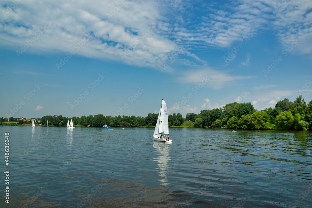 Moscow, Russia - July 15, 2021: Sailboats on the river, Klyazminskoye reservoir near Moscow