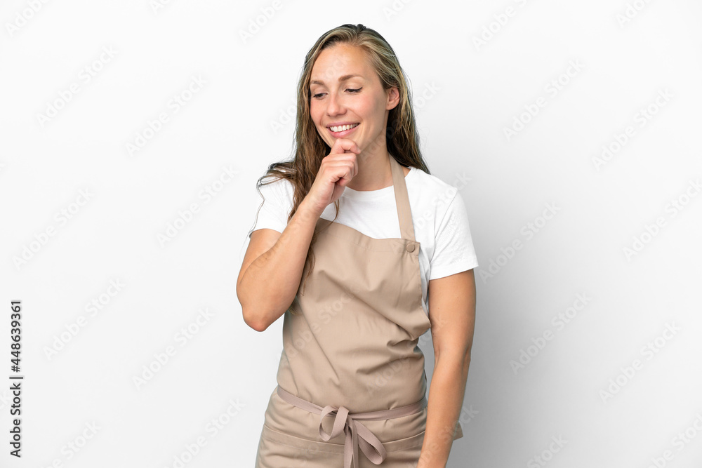 Restaurant waiter caucasian woman isolated on white background looking to the side Restaurant waiter caucasian woman isolated on white background looking to the side