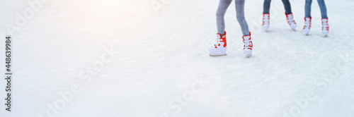 Fototapeta Legs skating on ice