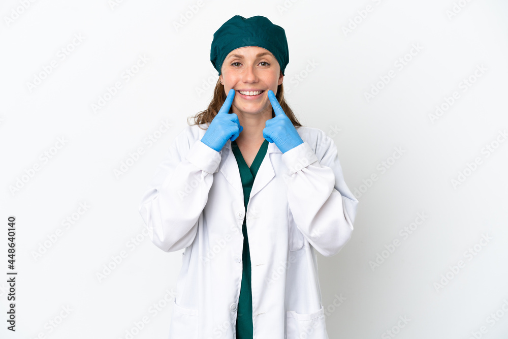 Surgeon caucasian woman in green uniform isolated on white background smiling with a happy and pleasant expression Surgeon caucasian woman in green uniform isolated on white background smiling with a happy and pleasant expression