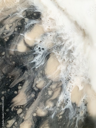 Abstract painting, pour epoxy resin, beige, black,gold and white color. Fluidity, cells, bubbles, marble or stone texture. close-up fragment, trendy liquid art for background, screensaver, poster