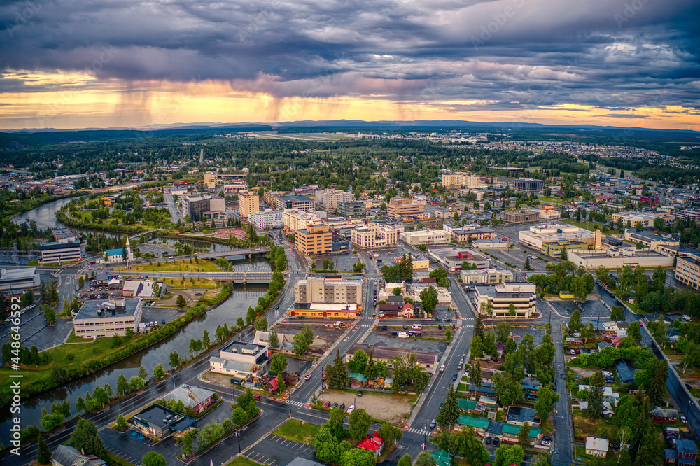 Fototapeta premium Aerial View of Downtown Fairbanks, Alaska during a stormy Summer Sunset