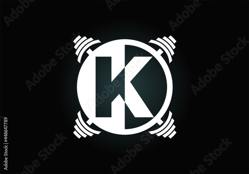 Initial K monogram alphabet with a barbell. Lifting vector logo design. Modern vector logo for bodybuilding, gym, fitness club, business, and company identity