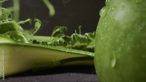 Fascinating probelens super closeup macro dolly shot of green fruit and vegetable