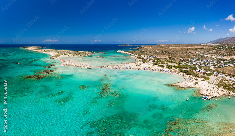 Aerial panoramic view of a narrow sandy beach and beautiful tropical lagoons (Elafonissi, Crete)