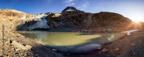Panoramic View of Vibrant Colorful Glacier Lake up in Rocky Mountains in Canadian Nature Landscape. Sunny Summer Sunset. Wedgemount Lake Hike in Whistler, British Columbia, Canada. Background Panorama © edb3_16