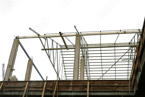 building under construction, scaffolding on a site