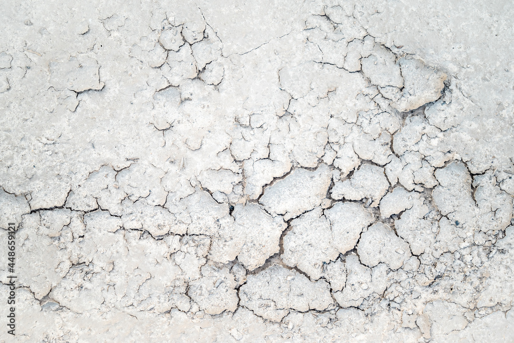 White sand background pattern on the beach with cracks White sand background pattern on the beach with cracks