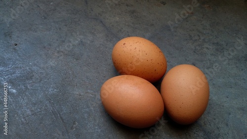 Chicken eggs on a floor background. Freshchicken eggs. Selective focus.