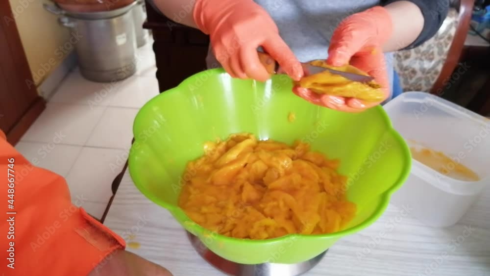 Organic homemade mango jam made as a family during a summer in quarantine Organic homemade mango jam made as a family during a summer in quarantine
