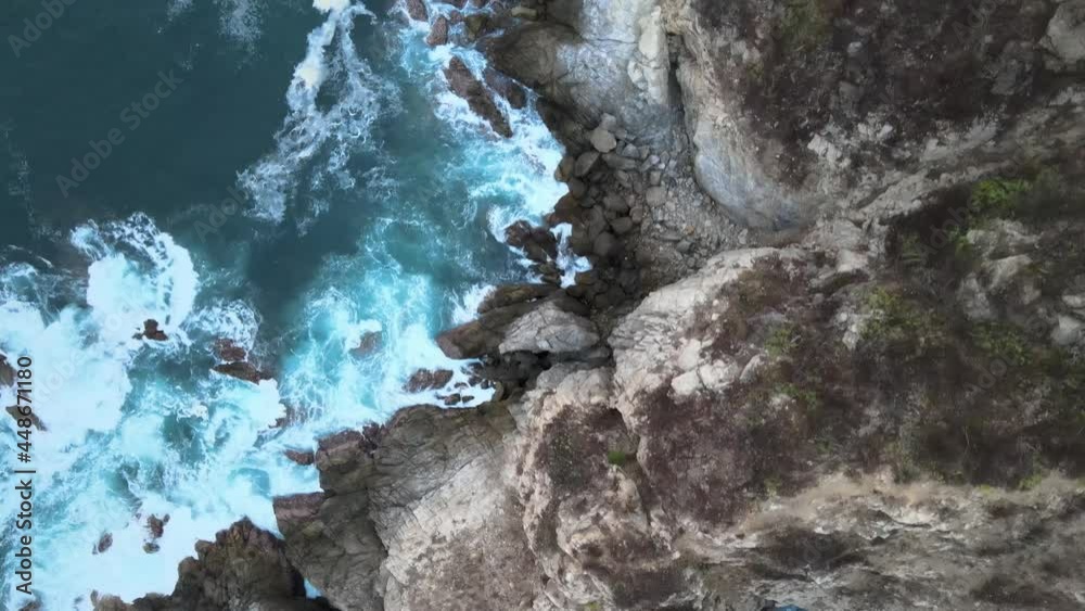 Zenith view of cliff and waves in Oaxaca's shore Zenith view of cliff and waves in Oaxaca's shore