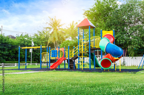 Colorful playground on yard in the park. photo