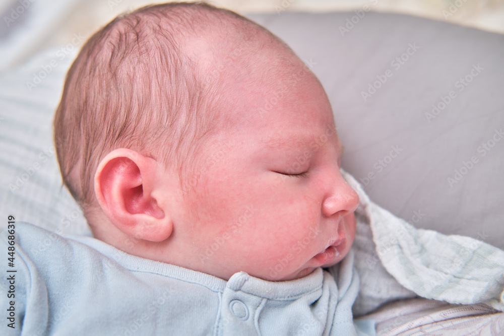 Portrait of a baby boy after feeding with milk on his lips, well-fed child face Portrait of a baby boy after feeding with milk on his lips, well-fed child face