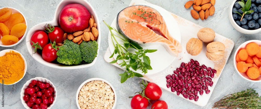 Best products for heart on dark gray background. Clean eating concept. Best products for heart on dark gray background. Clean eating concept.