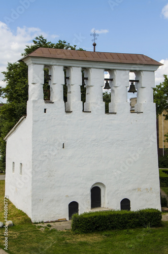 Bell tower at the Church of the Assumption from Paromenya, Pskov, Russia photo