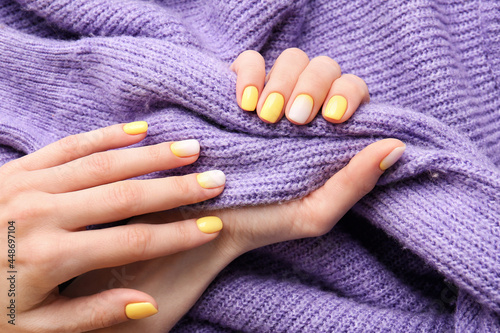 Female hands with beautiful manicure and clothes, closeup