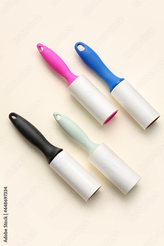 Different lint rollers on color background Different lint rollers on color background