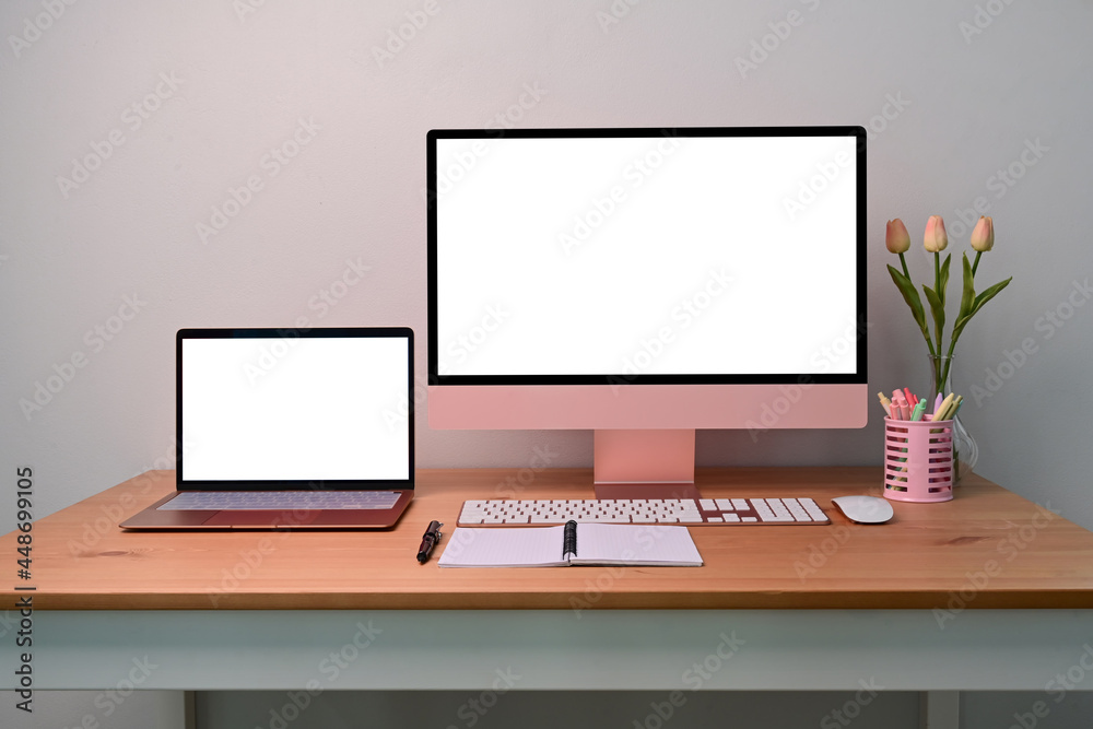 Modern workplace with computer, laptop and supplies on wooden desk. Modern workplace with computer, laptop and supplies on wooden desk.