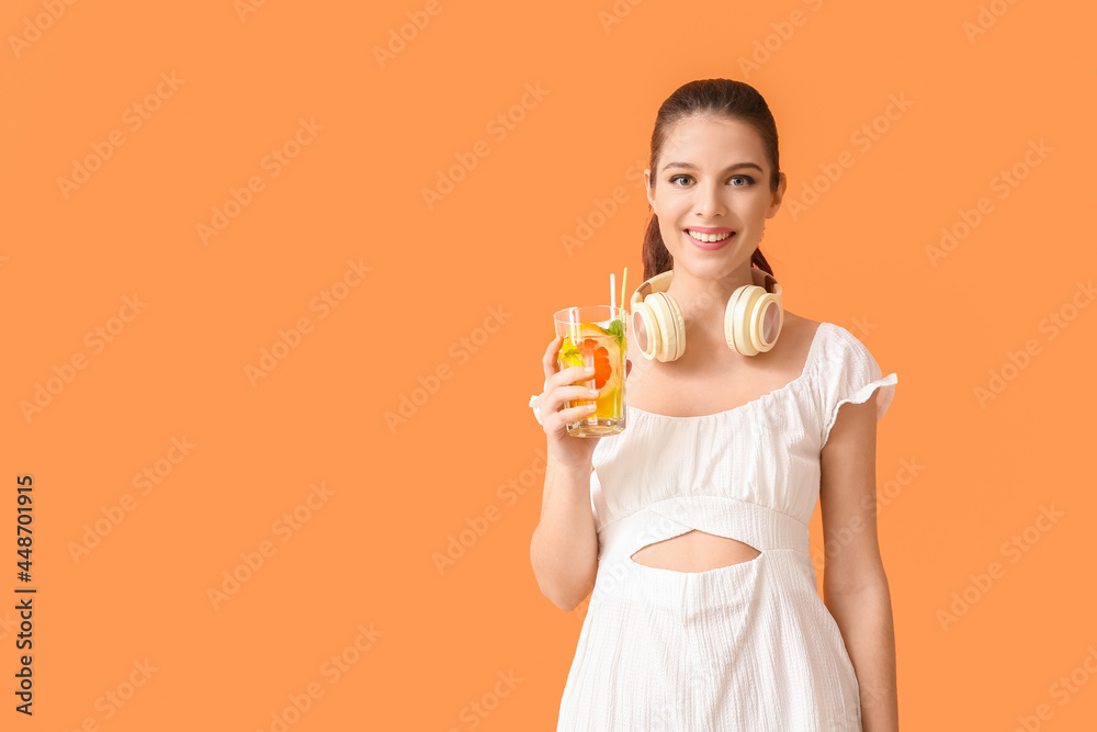 Young woman with fresh lemonade on color background Young woman with fresh lemonade on color background