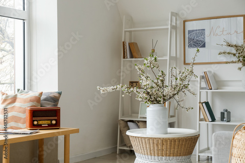 Vase with blossoming branch...