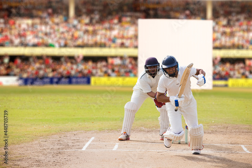 Batsman taking a run during a match