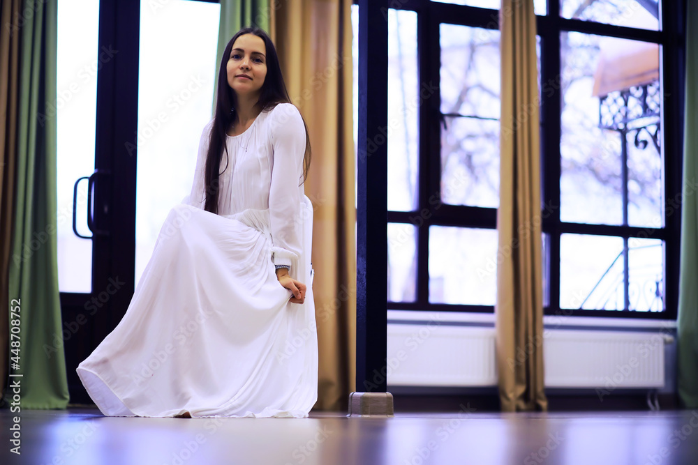 Relaxed serene pretty young woman at home, happy calm lady dream enjoy wellbeing breathing fresh air in cozy home Relaxed serene pretty young woman at home, happy calm lady dream enjoy wellbeing breathing fresh air in cozy home