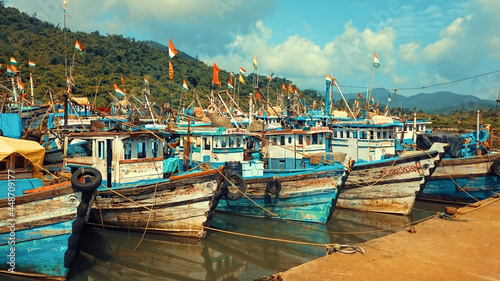 Fishing boats anchored at Amdalli port near Karwar in Karnataka
