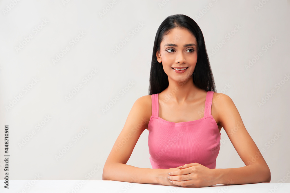 Portrait of a young woman with clear,spotless skin smiling. Portrait of a young woman with clear,spotless skin smiling.