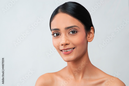 Принти на полотні Portrait of a young woman with clear,spotless skin.