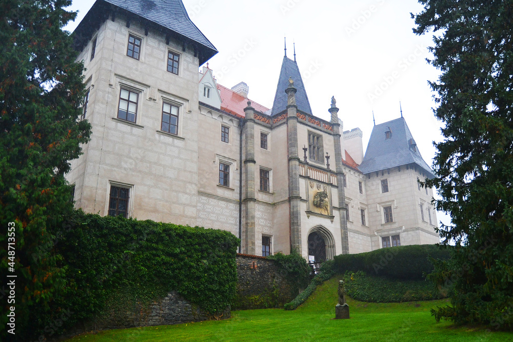 Medieval Žleby castle (Zámek Žleby) on rainy autumn day. Žleby, The Central Bohemian Region, Czech Republic