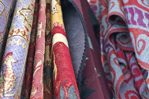 Close-up of colorful rugs in different patterns.